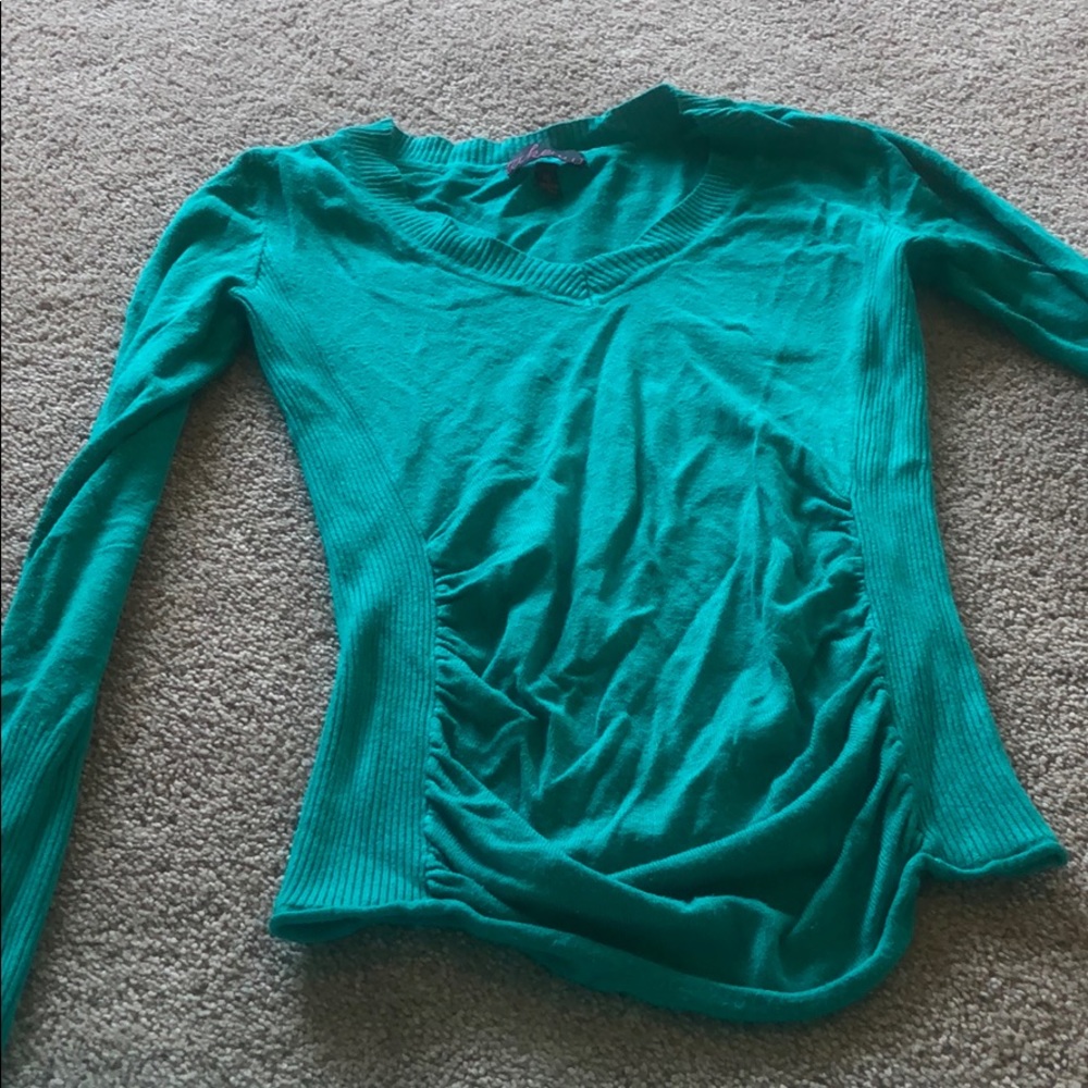 Teal green sweaters